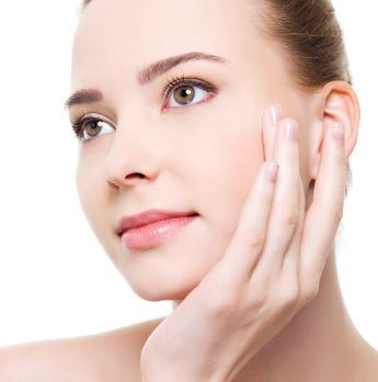 Beauty Caucasian Young Woman Applying Cosmetic Under Eyes